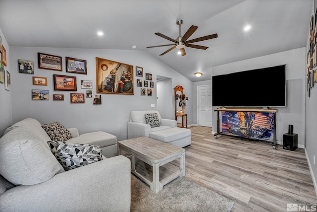 233 Jennys Ln, Fernley, NV 89408 - living room featuring a ceiling fan, light wood-style flooring, vaulted ceiling, baseboards, and recessed lighting