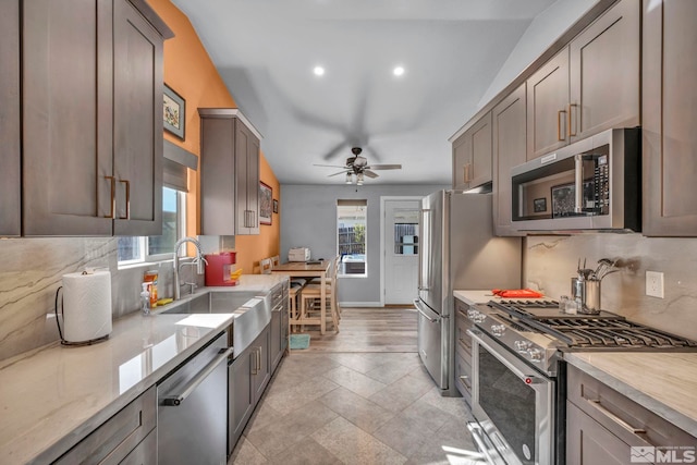 233 Jennys Ln, Fernley, NV 89408 - kitchen with appliances with stainless steel finishes, tasteful backsplash, a sink, a ceiling fan, and recessed lighting