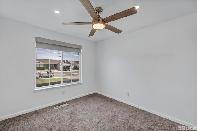 233 Jennys Ln, Fernley, NV 89408 - carpeted spare room with baseboards, ceiling fan, and recessed lighting