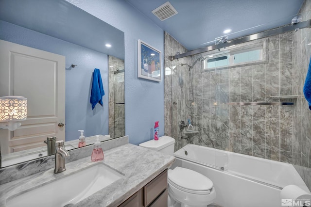 233 Jennys Ln, Fernley, NV 89408 - bathroom featuring toilet, vanity, combined bath / shower with glass door, and a textured wall