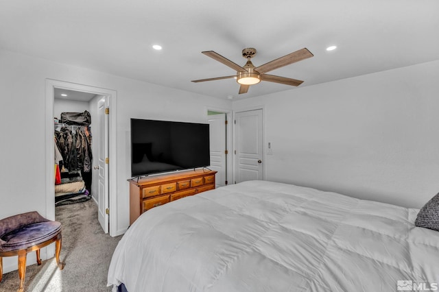 233 Jennys Ln, Fernley, NV 89408 - bedroom featuring carpet floors, a walk in closet, a closet, recessed lighting, and a ceiling fan