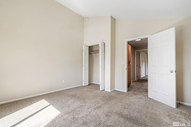 3924 Pheasant Dr, Carson City, NV 89701 - unfurnished bedroom with carpet, vaulted ceiling, baseboards, and a closet