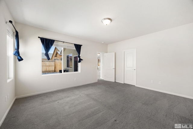 14408 Durham Dr, Reno, NV 89506 - carpeted spare room with baseboards