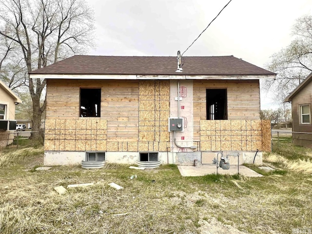 460 5th St, Battle Mountain, NV 89820 - view of home's exterior with roof with shingles and fence