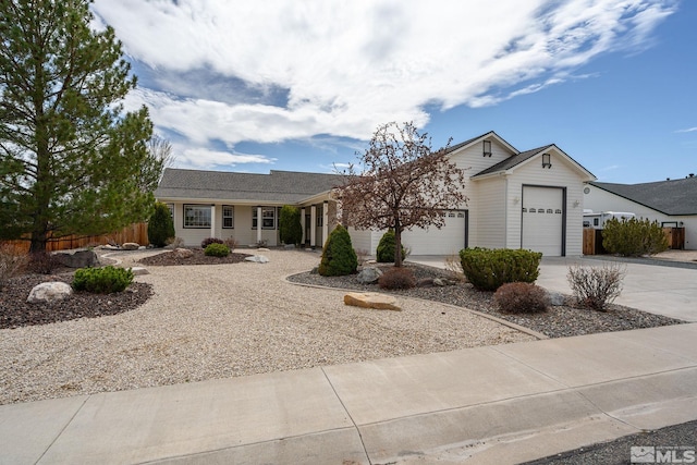 1147 Country Club Dr, Minden, NV 89423 - ranch-style home with concrete driveway, a garage, and fence