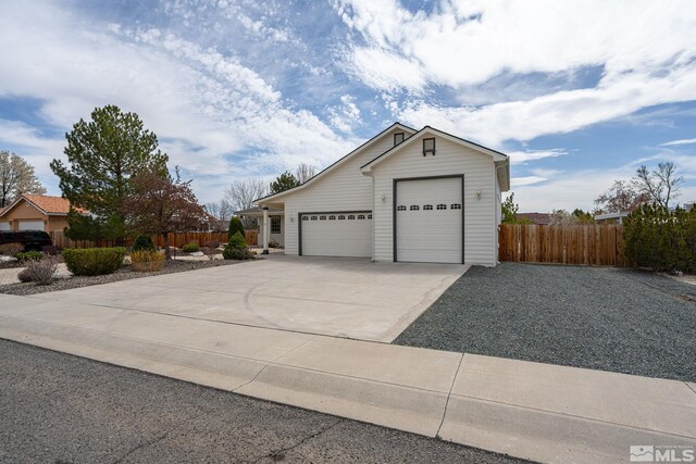 1147 Country Club Dr, Minden, NV 89423 - garage with fence and concrete driveway