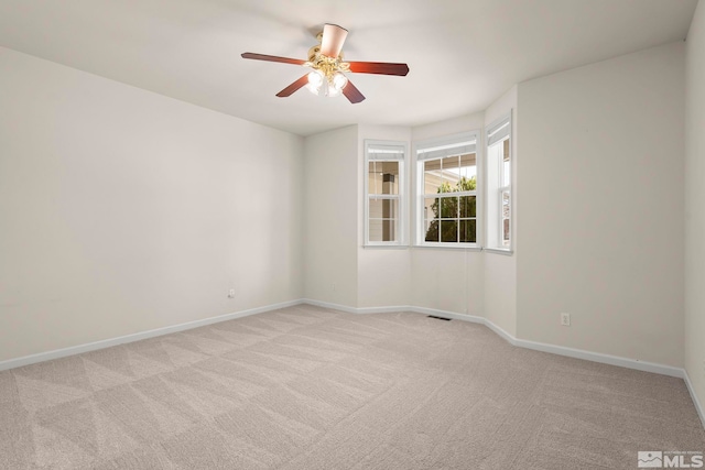 1147 Country Club Dr, Minden, NV 89423 - empty room featuring light colored carpet, ceiling fan, and baseboards