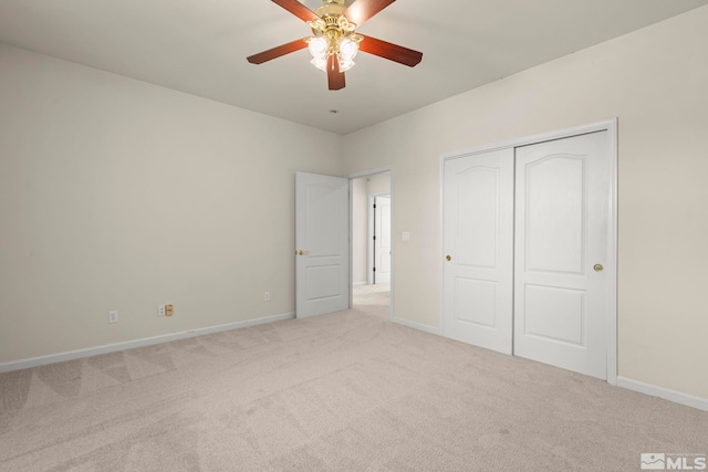 1147 Country Club Dr, Minden, NV 89423 - unfurnished bedroom featuring light carpet, baseboards, and a closet