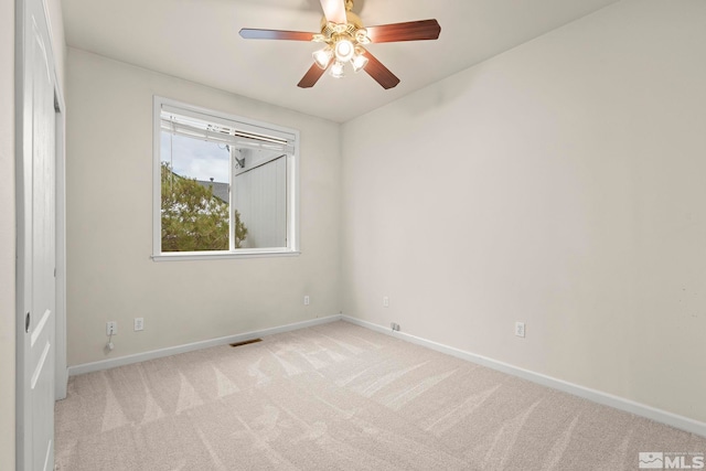 1147 Country Club Dr, Minden, NV 89423 - empty room with carpet flooring, baseboards, and a ceiling fan