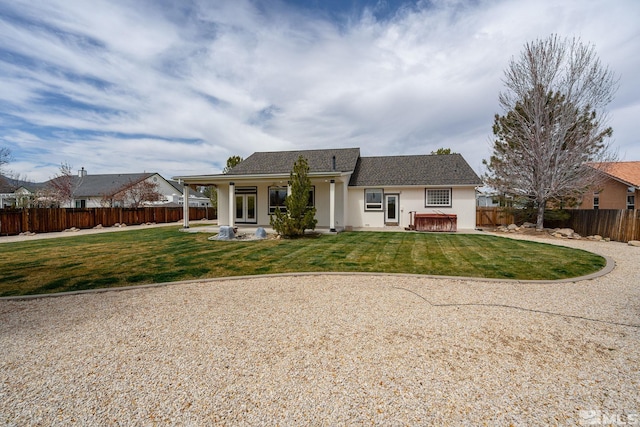 1147 Country Club Dr, Minden, NV 89423 - view of front of house with stucco siding, a patio area, and a hot tub