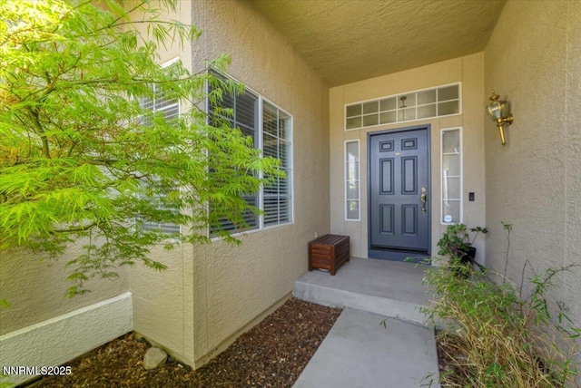 5024 E Albuquerque Rd, Reno, NV 89511 - doorway to property with stucco siding