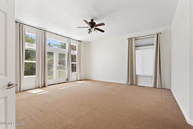 5024 E Albuquerque Rd, Reno, NV 89511 - carpeted spare room featuring ceiling fan and french doors