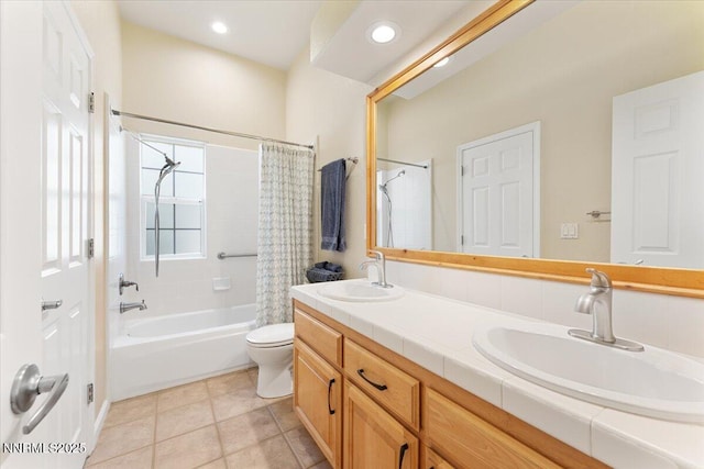5024 E Albuquerque Rd, Reno, NV 89511 - full bathroom with shower / bath combination with curtain, double vanity, tile patterned floors, and recessed lighting