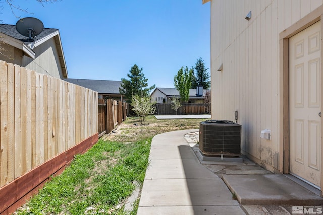 503 Windchase Dr, Dayton, NV 89403 - view of yard featuring fence, cooling unit, and a patio area