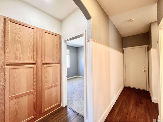 1480 Shadow Ln, Fernley, NV 89408 - corridor with dark wood-type flooring and arched walkways