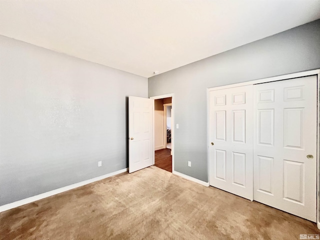 1480 Shadow Ln, Fernley, NV 89408 - unfurnished bedroom with carpet, baseboards, and a closet