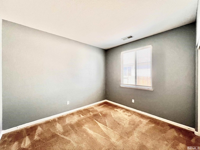1480 Shadow Ln, Fernley, NV 89408 - spare room with carpet floors and baseboards