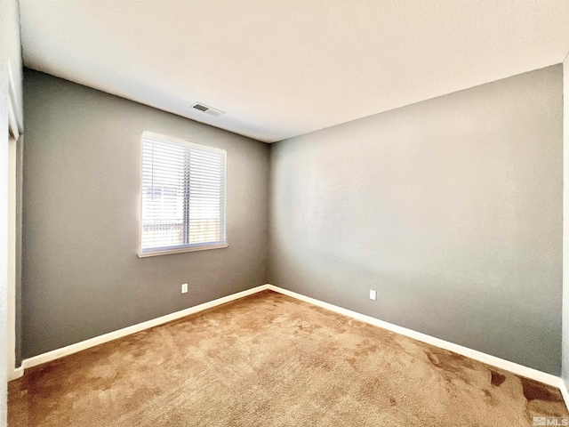 1480 Shadow Ln, Fernley, NV 89408 - empty room with carpet and baseboards