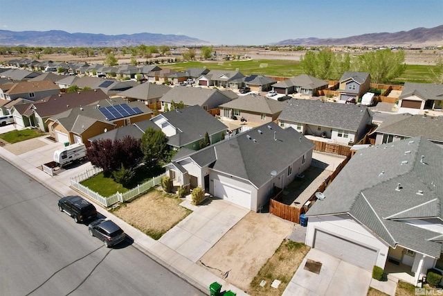 1480 Shadow Ln, Fernley, NV 89408 - aerial perspective of suburban area with a mountainous background