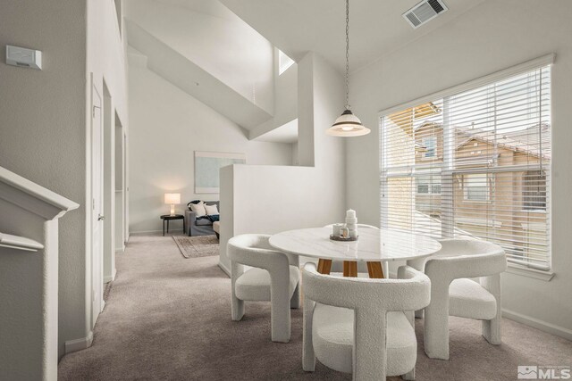 1325 S Meadows Pkwy Unit 322, Reno, NV 89521 - carpeted dining room with baseboards