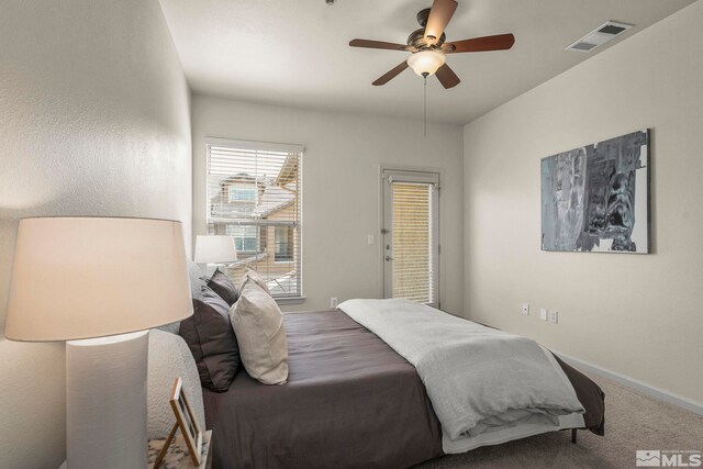 1325 S Meadows Pkwy Unit 322, Reno, NV 89521 - carpeted bedroom with baseboards and ceiling fan