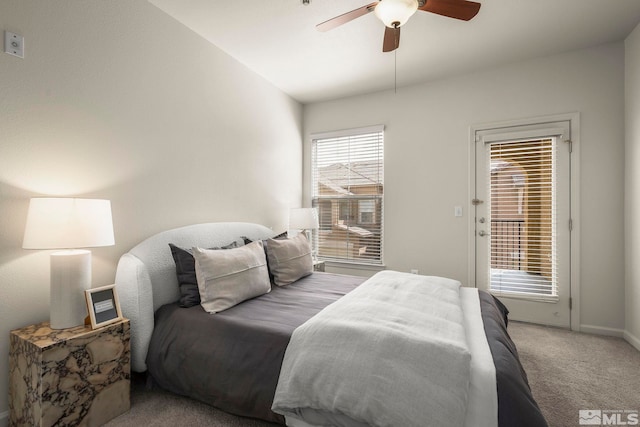 1325 S Meadows Pkwy Unit 322, Reno, NV 89521 - carpeted bedroom featuring access to exterior, ceiling fan, and baseboards