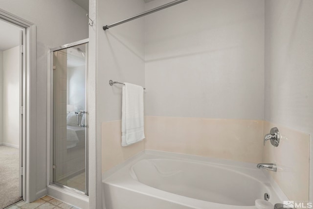 1325 S Meadows Pkwy Unit 322, Reno, NV 89521 - full bathroom with a shower stall and a bath