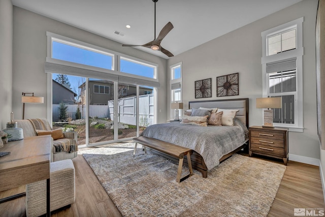 5469 Side Saddle Trl, Reno, NV 89511 - bedroom with access to outside, wood finished floors, ceiling fan, baseboards, and recessed lighting