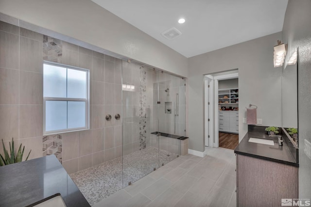 5469 Side Saddle Trl, Reno, NV 89511 - full bath featuring a stall shower, double vanity, and a spacious closet