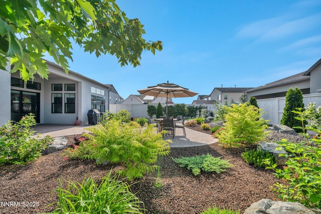 5469 Side Saddle Trl, Reno, NV 89511 - fenced backyard featuring a patio