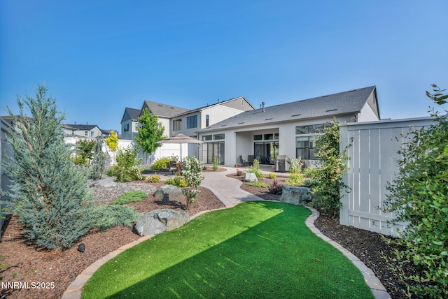5469 Side Saddle Trl, Reno, NV 89511 - back of house with stucco siding, a patio, and a shingled roof