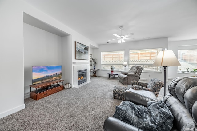 1510 Corleone Dr, Sparks, NV 89434 - living area featuring carpet, healthy amount of natural light, a ceiling fan, and a tiled fireplace
