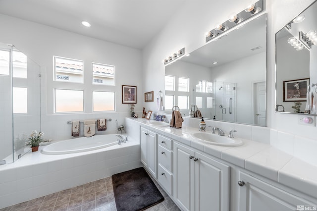 1510 Corleone Dr, Sparks, NV 89434 - bathroom with a shower stall, a garden tub, double vanity, and recessed lighting