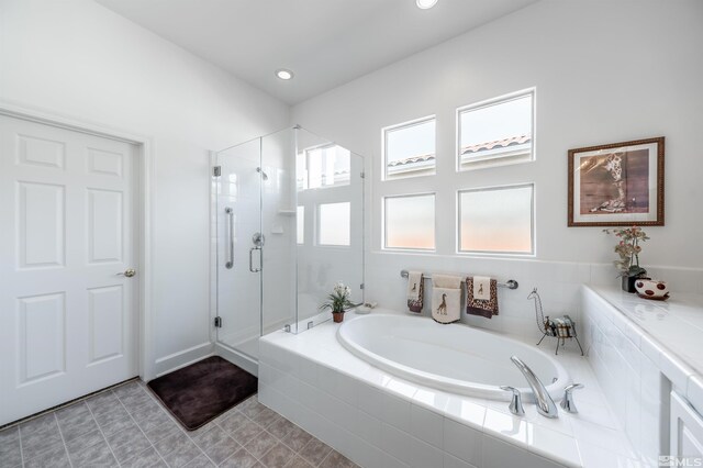 1510 Corleone Dr, Sparks, NV 89434 - full bathroom featuring a bath, a stall shower, and recessed lighting