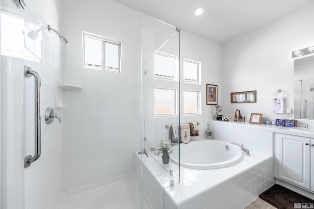 1510 Corleone Dr, Sparks, NV 89434 - full bathroom with a garden tub, a tile shower, and vanity