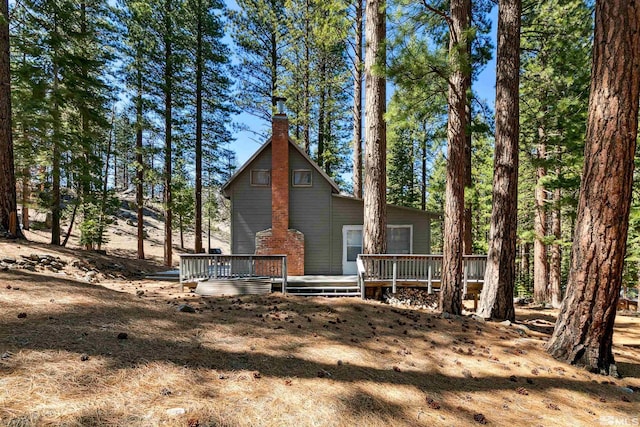 40 Shay Creek Rd, Markleeville, CA 96120 - back of property featuring a deck and a chimney