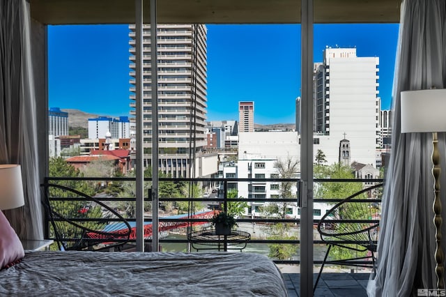 280 Island Ave Unit 904, Reno, NV 89501 - bedroom featuring a city view and multiple windows