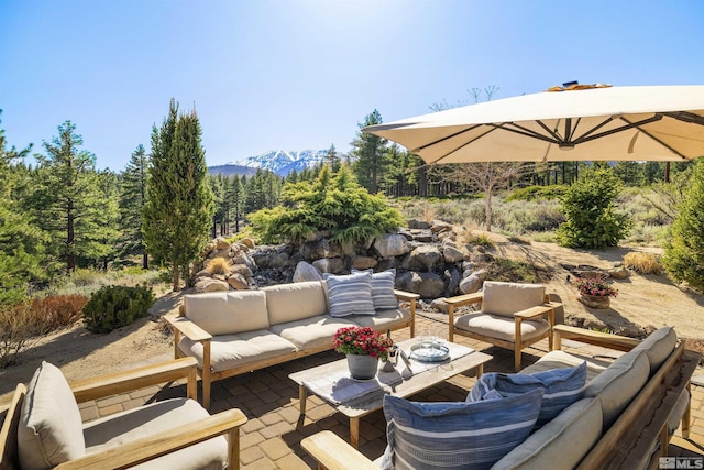 120 W Willis Ln, Reno, NV 89511 - view of patio featuring an outdoor living space and a mountain view
