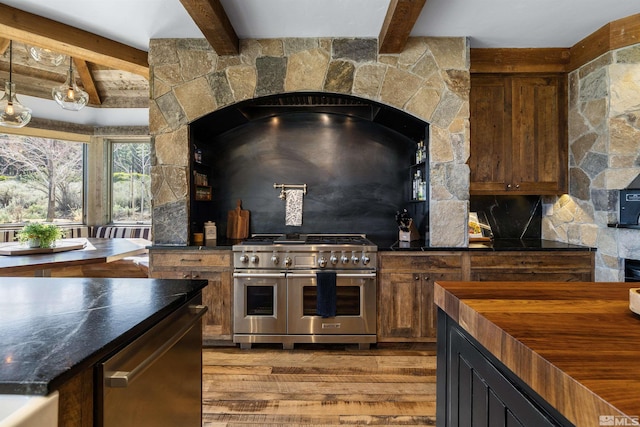 120 W Willis Ln, Reno, NV 89511 - kitchen featuring stainless steel appliances, light wood-style floors, butcher block counters, and beam ceiling