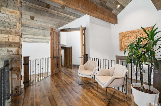 120 W Willis Ln, Reno, NV 89511 - living area featuring hardwood / wood-style flooring, high vaulted ceiling, and a stone fireplace