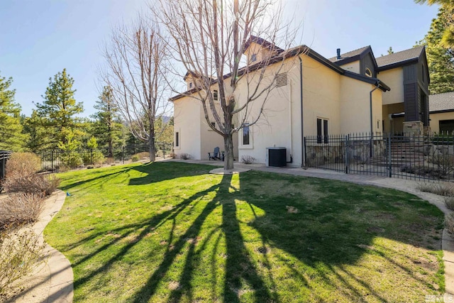 120 W Willis Ln, Reno, NV 89511 - back of property with stucco siding, central AC, a patio area, and a chimney