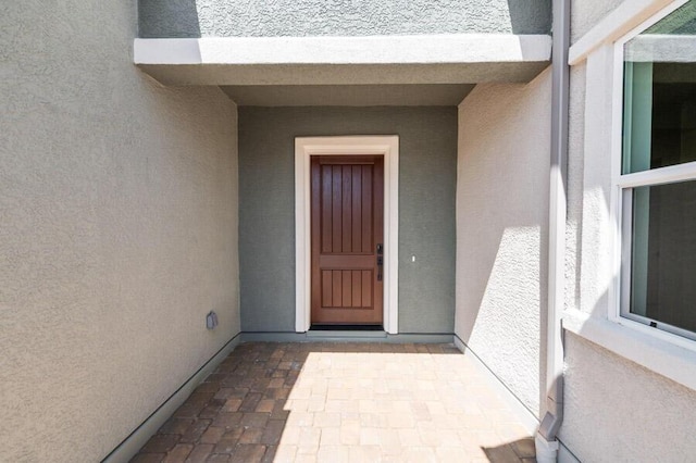 3237 Amaretto Way Unit Cinmon 64, Sparks, NV 89441 - doorway to property with stucco siding