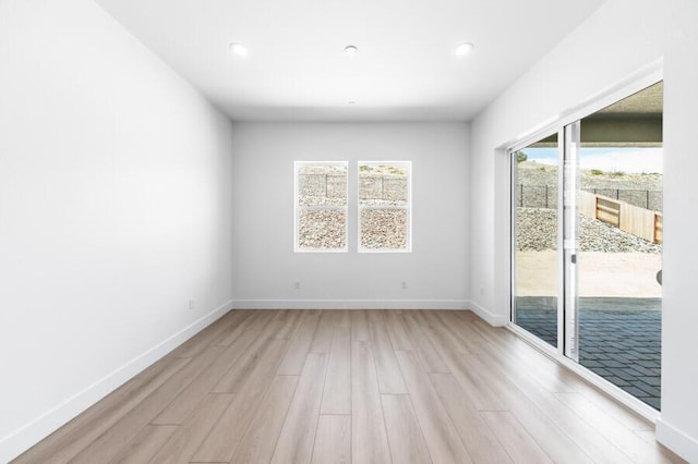 3237 Amaretto Way Unit Cinmon 64, Sparks, NV 89441 - unfurnished room with light wood-type flooring, baseboards, and recessed lighting