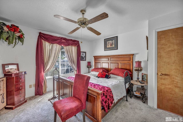 900 Mclean Rd, Fallon, NV 89406 - carpeted bedroom with ceiling fan and a textured ceiling