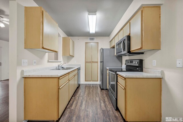 6850 Sharlands Ave Unit A2003, Reno, NV 89523 - kitchen with appliances with stainless steel finishes, a sink, dark wood-type flooring, light countertops, and light brown cabinets