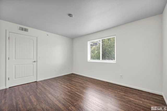 6850 Sharlands Ave Unit A2003, Reno, NV 89523 - unfurnished room with wood finished floors, baseboards, and a smoke detector