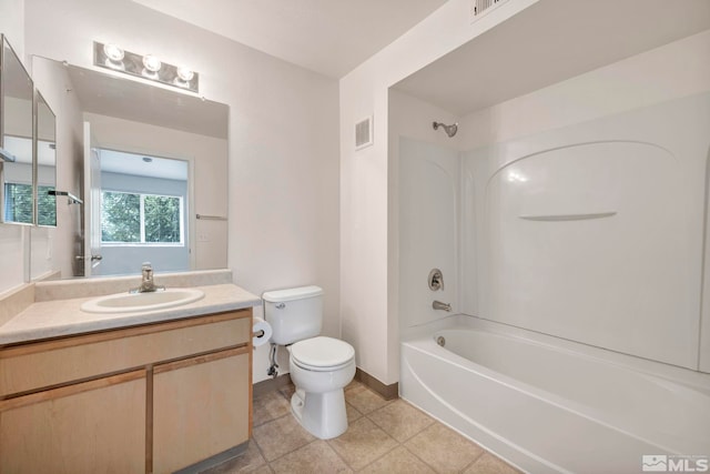 6850 Sharlands Ave Unit A2003, Reno, NV 89523 - bathroom featuring toilet, shower / bathtub combination, tile patterned flooring, vanity, and baseboards