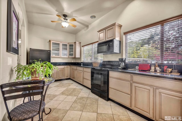 6850 Sharlands Ave Unit A2003, Reno, NV 89523 - kitchen with black appliances, ceiling fan, dark countertops, light tile patterned flooring, and glass insert cabinets