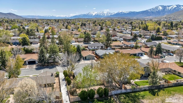 1308 Fremont, Carson City, NV 89701 - aerial view of property and surrounding area with nearby suburban area and a mountainous background