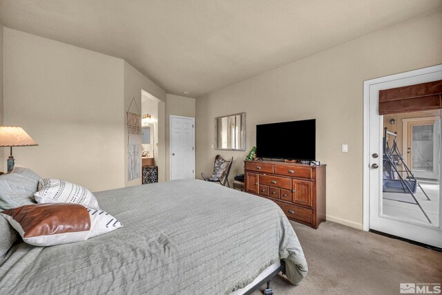 215 Red Wing Dr, Dayton, NV 89403 - carpeted bedroom with access to exterior, baseboards, and ensuite bathroom